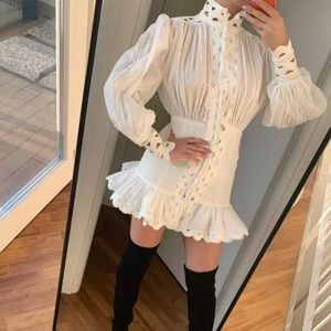 Ruffled white dress, puffy sleeves